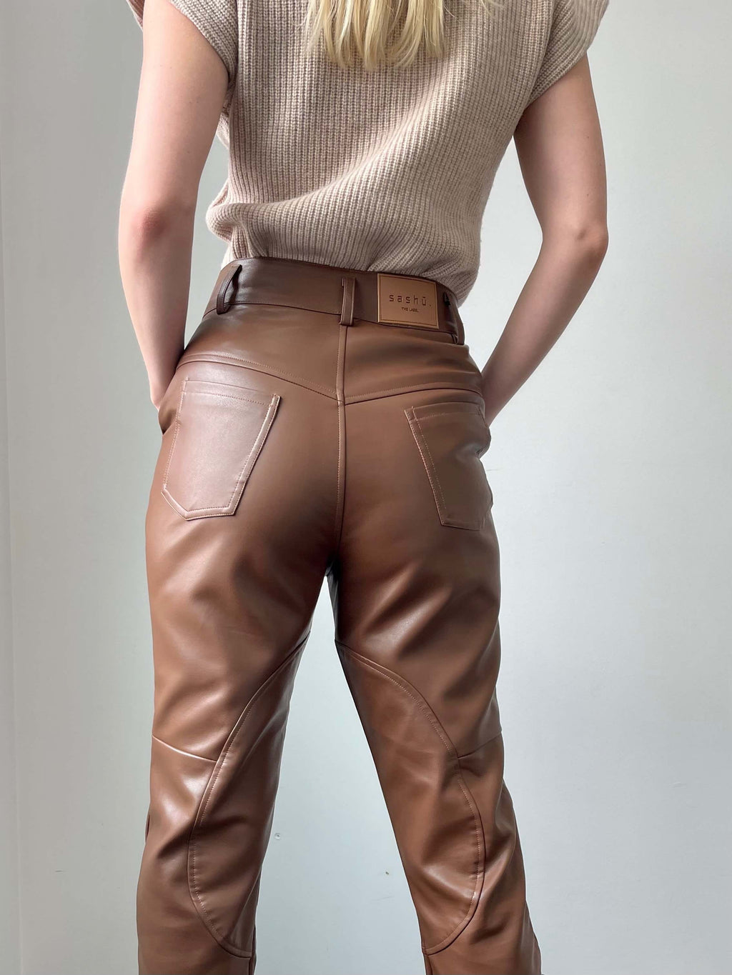Chocolate dipped waist straight legged faux leather pants